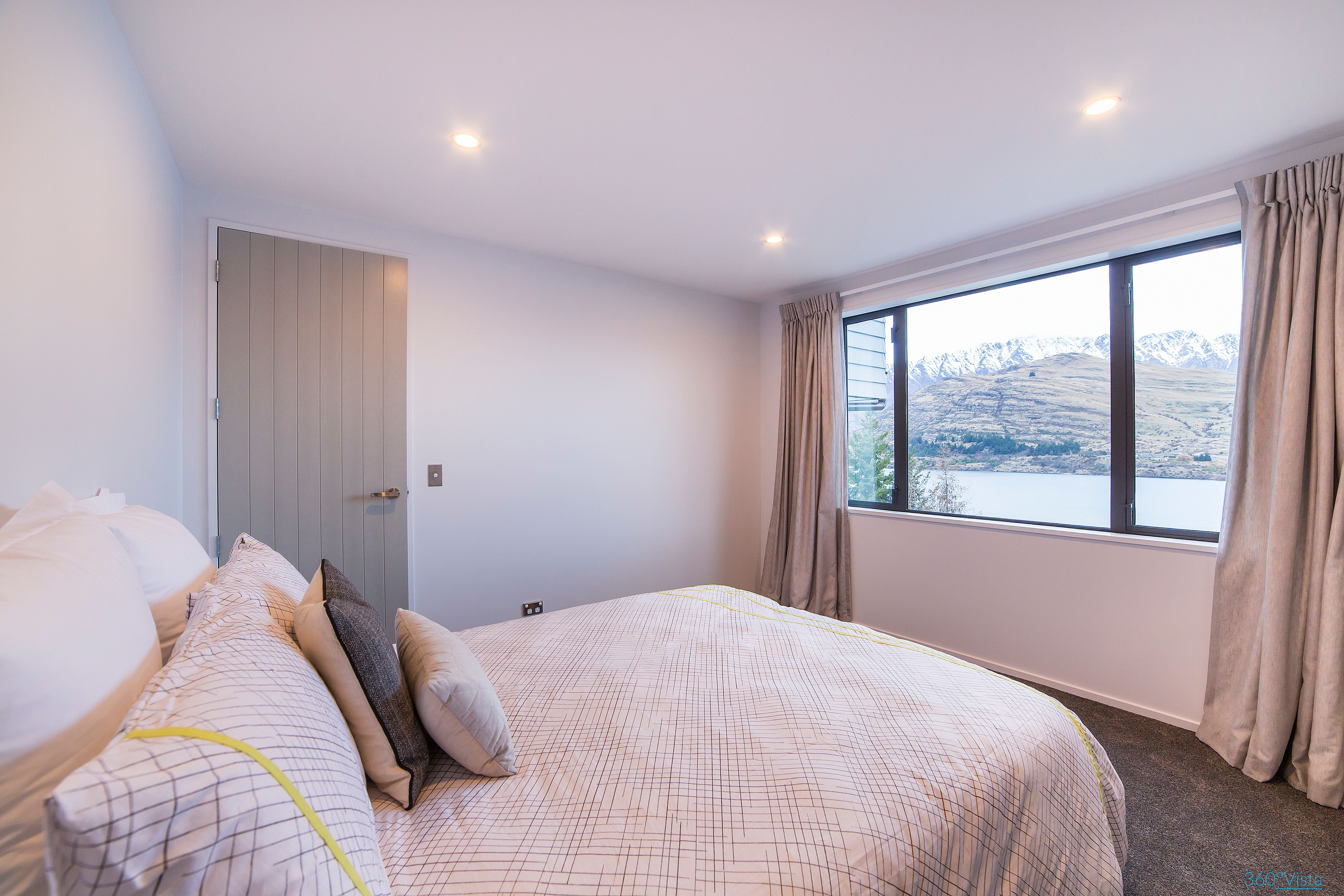 Comfortable downstairs bedroom with modern amenities and peaceful ambiance